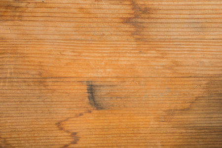 Wooden table surface: bright structure on a dark background. Abstract wood textureの写真素材
