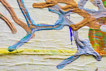 Colorful abstract background, fragment of graffiti painted on a wall.の写真素材