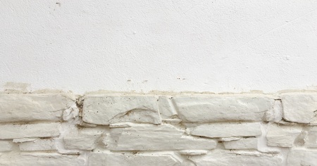 Stone wall background. White painted stone wall texture as background. Wood background wall paintingの写真素材