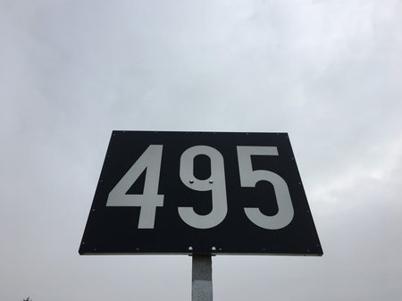 Road sign with a blue sky and white clouds: hedge fund. Road signs, notification signal