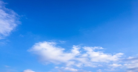 Beautiful blue sky with clouds background.の写真素材