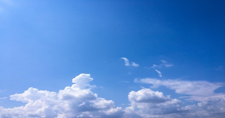Beautiful blue sky with clouds background.Sky clouds.Sky with clouds weather nature cloud blue.Blue sky with clouds and sunの写真素材