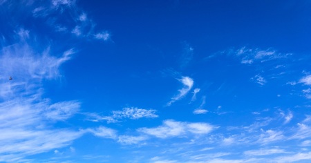 Beautiful clouds against a blue sky background. Cloud sky. Blue sky with cloudy weather, nature cloud. White clouds, blue sky and sunの写真素材