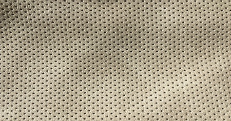 Beige artificial Leather background texture. Closeup of seamless white Leather texture backgroundの写真素材