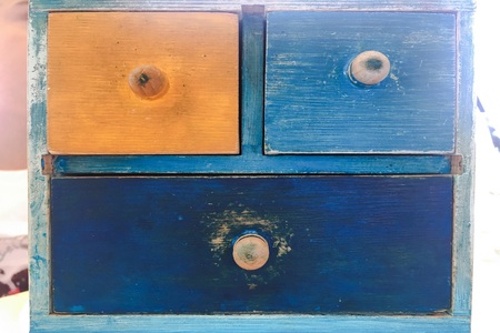 Colorful Wooden Drawer, vintage wooden commode at brick wall. Timber Cupboard Unitの写真素材