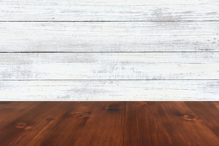 old brown oak wooden table on the blurry wood wall background, wood tableの写真素材