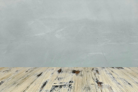 washed wood table with concrete texture background
