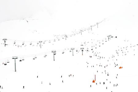 Landscapes and people skiing in the snow in Andorraの写真素材