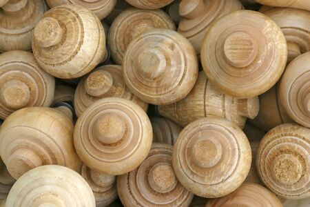 Background with a lot of wooden spin topsの写真素材