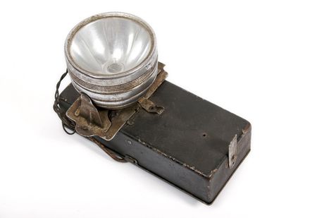 Old metal flashlight of batteriesの写真素材