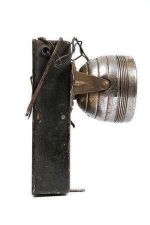 Old metal flashlight of batteriesの写真素材