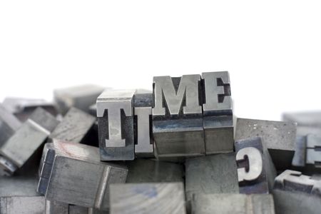 Printers blocks with the word TIME. Upper case letters.の写真素材