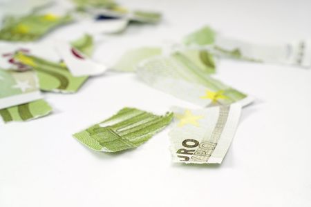 Ripped euro banknote on white background.の写真素材
