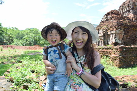 mother and her son are doing sight seeing at Mi-sonの写真素材