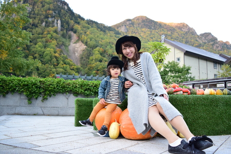 young japanese mother is playing with her sonの写真素材