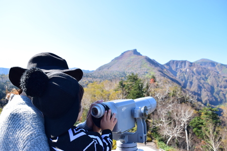 young japanese son is playing with motherの写真素材