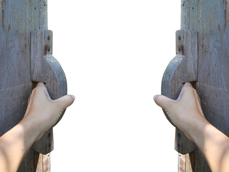 Man ands opening old wooden door.の写真素材