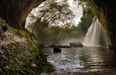 big water fall view from in the caveの写真素材