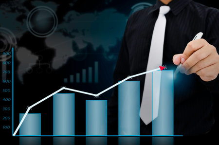 Businessman drawing present infographs