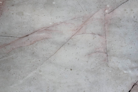 White stone surface with pink lines.の写真素材