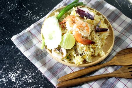 Seafood fried rice that is delicious, placed on the table for you when you're hungry.の写真素材