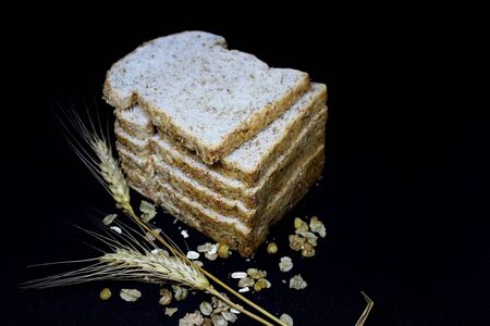Bread on a black background.の写真素材