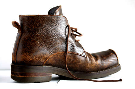 The left brown boot with white backgroundの写真素材