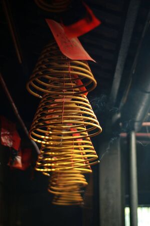 The hanging incense coils of a Chinese templeの写真素材