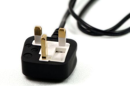 A close up view of electrical plug on whiteの写真素材