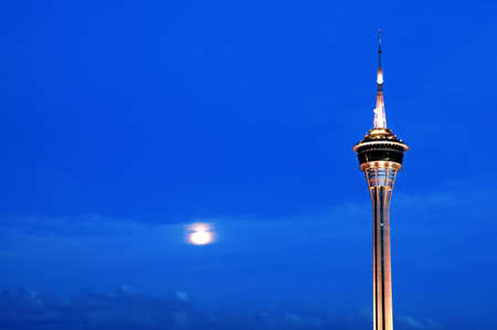 The top of Macau tower convention over night skyのeditorial素材