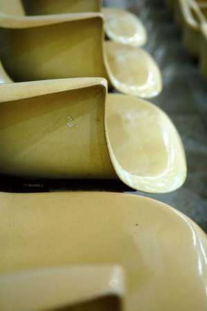 Close up view of line of chairs in stadiumの写真素材