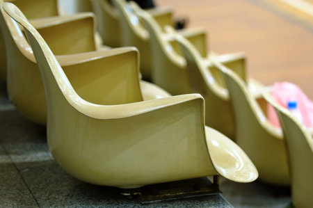 Close up view of line of chairs in stadiumの写真素材