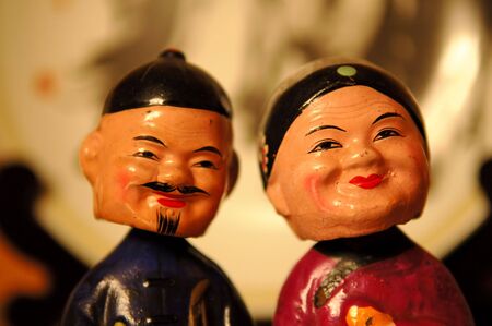 The close up heads of Chinese figurinesの写真素材