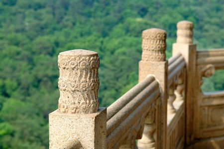 The close up view of stone carved handrail at Chinese pagodaの写真素材