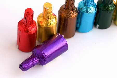 Close up view of colorful chocolate bottles の写真素材