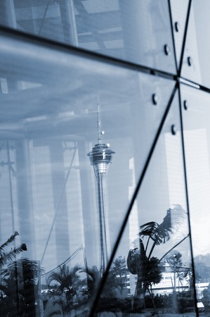 The reflection of Macau Tower and Convention Centre on glass のeditorial素材