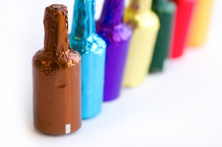 Close up view of colorful chocolate bottles の写真素材