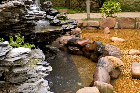Stone pond as landscaping design element in garden
の写真素材
