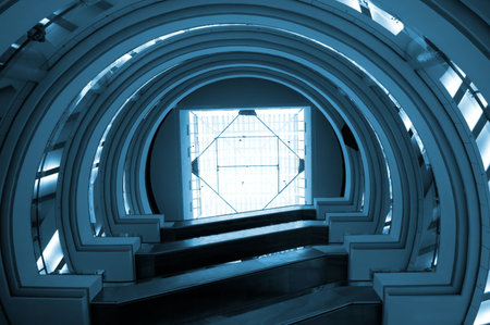 View from below of interior futuristic glass buildingの写真素材