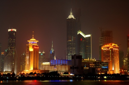 SHANGHAI - AUG 14: The panorama of Shanghai Pudong district at night, view from the Bund. August 14, 2007, in ShangHai, Chinaのeditorial素材