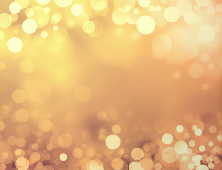 Shiny gold background with blurry circles and sparkles Shiny gold background with blurry circles and sparkles