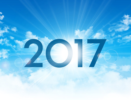 New Year 2017 type high in blue sky with the sun rising up behindの写真素材