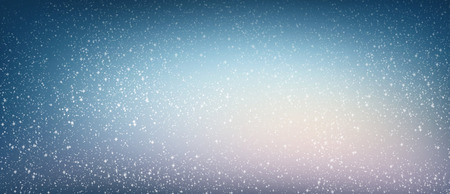 White snow falling on a shiny blue night backgroundの写真素材