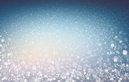 White snow shapes and soft lights on a blue iced backgroundの写真素材