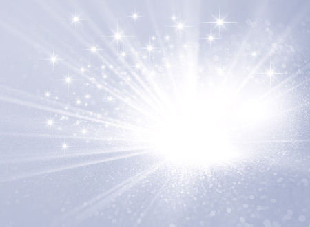 Glittering silver background with stars and light explosionの写真素材