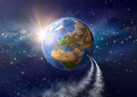 Spaceships landing on planet Earth, sunlight shining behind into deep space. Elements of this image furnished by NASA - 3D illustration.の写真素材