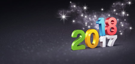 Colorful date 2018 above 2017 on a festive black background, with glitters and stars - 3D...