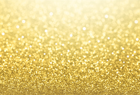 Glittering defocused gold background - Festive materialの写真素材