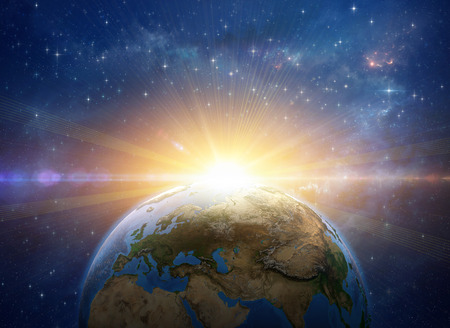 Sun rising over the Earth in deep space. Giant meteor explosion on the planet. Global warming concept. 3D illustrationの写真素材
