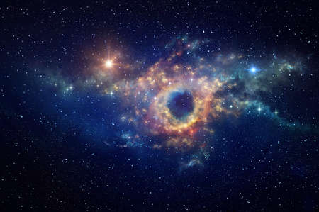 Black hole and cosmic waves into deep space. Nebula at the center of a galaxy clusters in universe. Stars constellations background.の写真素材